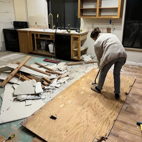 Tearing up the old kitchen floor